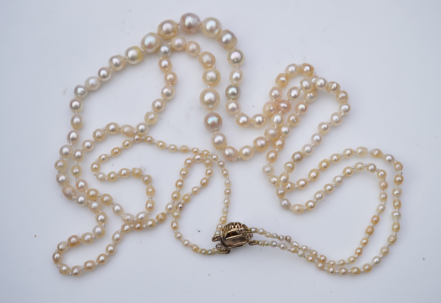 A natural pearl and diamond necklace, early 20th century